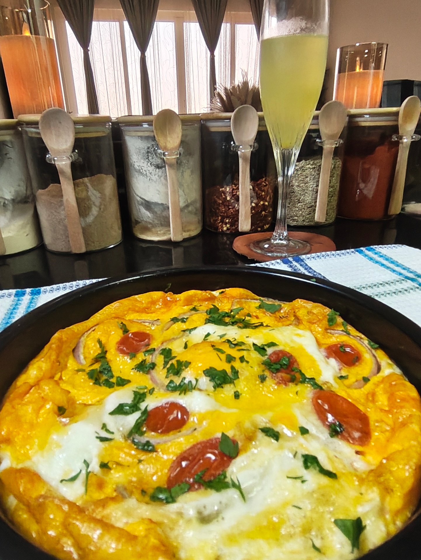 Air fryer tomato and onion omelette finished with fresh parsley
