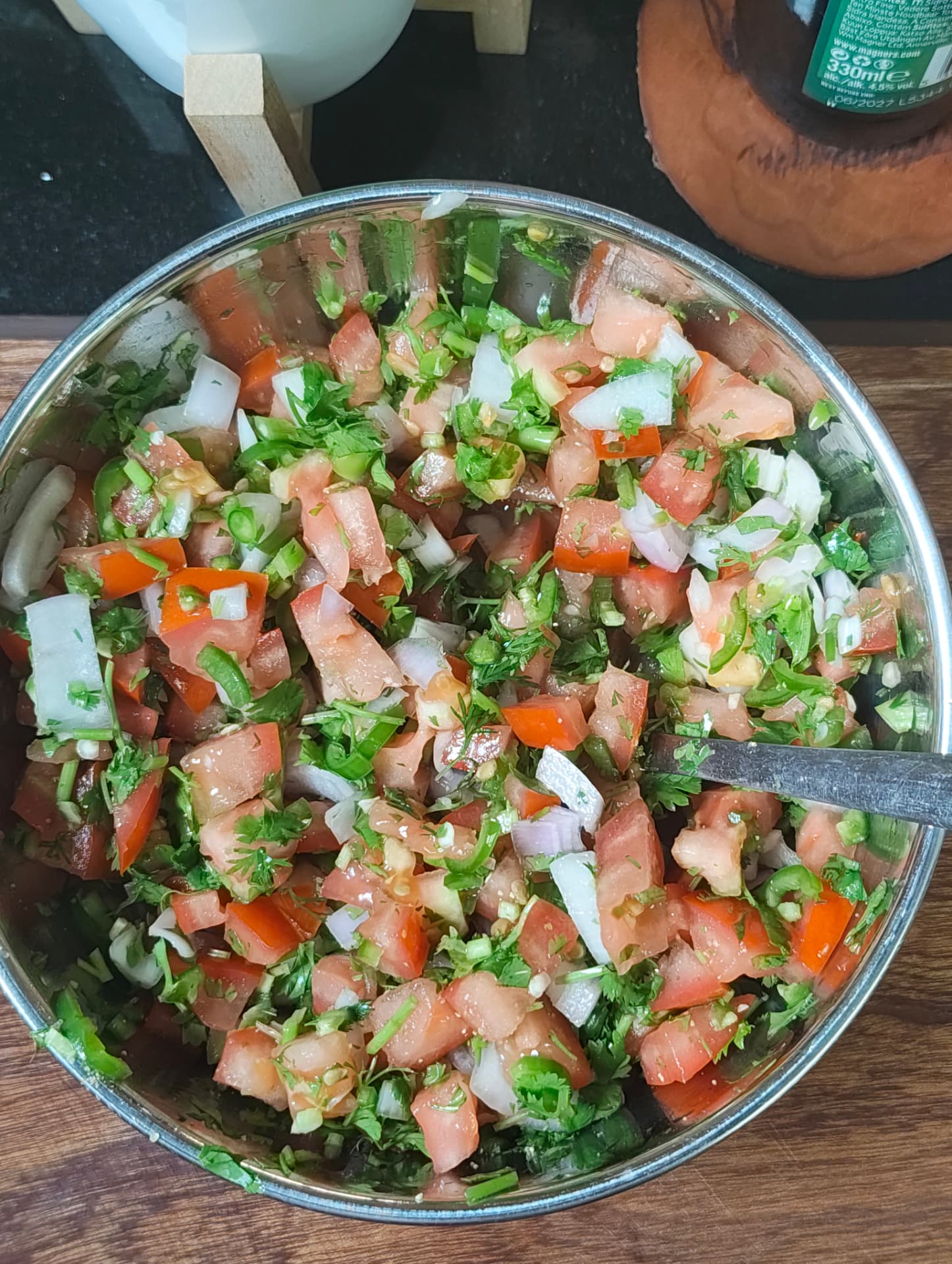 Fresh tomato and onion kachumbari with coriander and green chillies