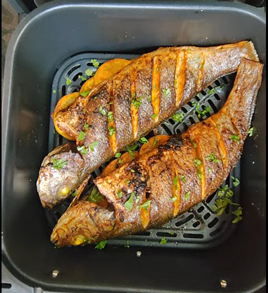 Golden scored whole sea bass cooked in the air fryer