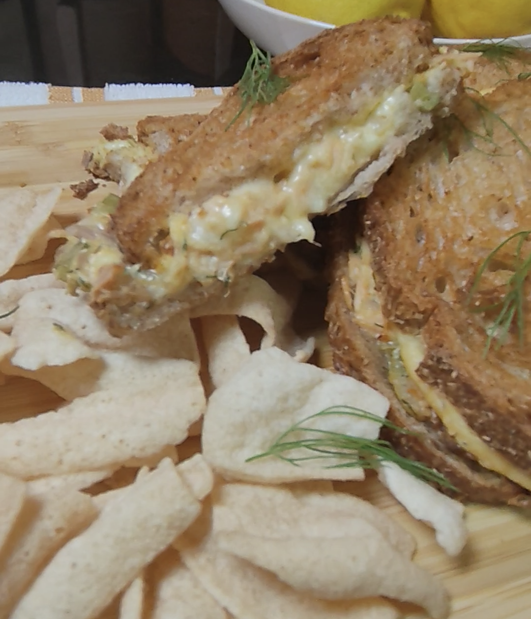 Air fryer salmon melt cut open with melted cheese and salmon filling